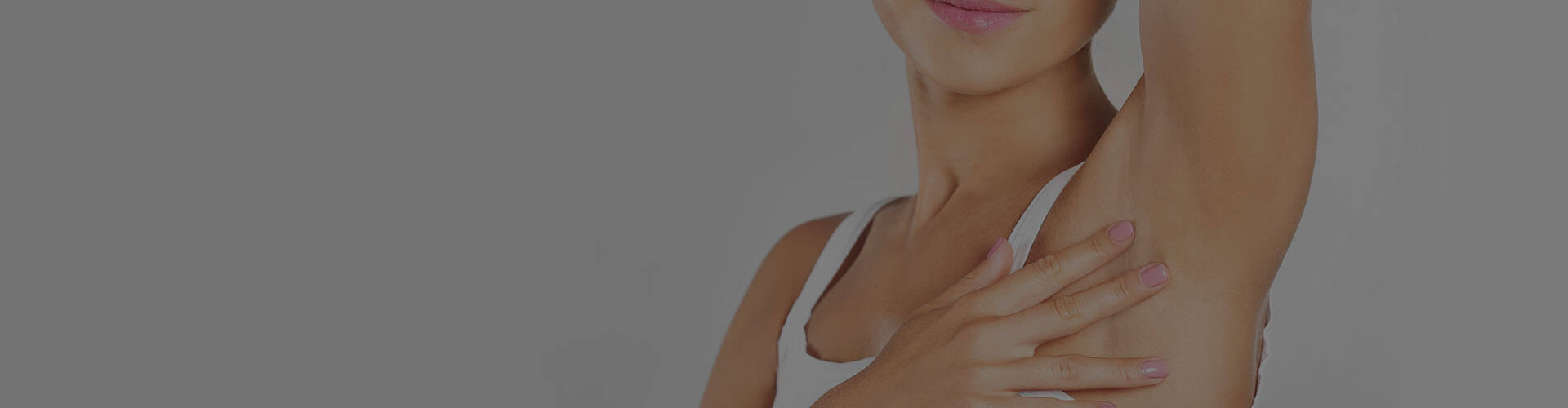 Image of woman lifting her arm