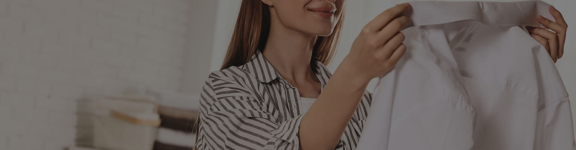 Image of person holding a clean shirt